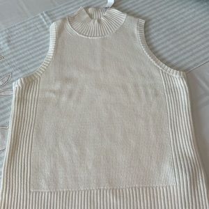 GAP Sleeveless Mock Turtleneck Sweater in Cream.